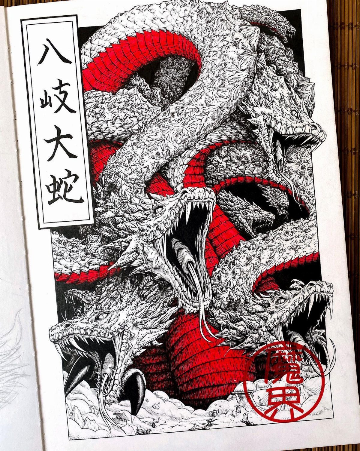 Multi-headed Japanese serpent drawing with white scales and red underbelly on paper.