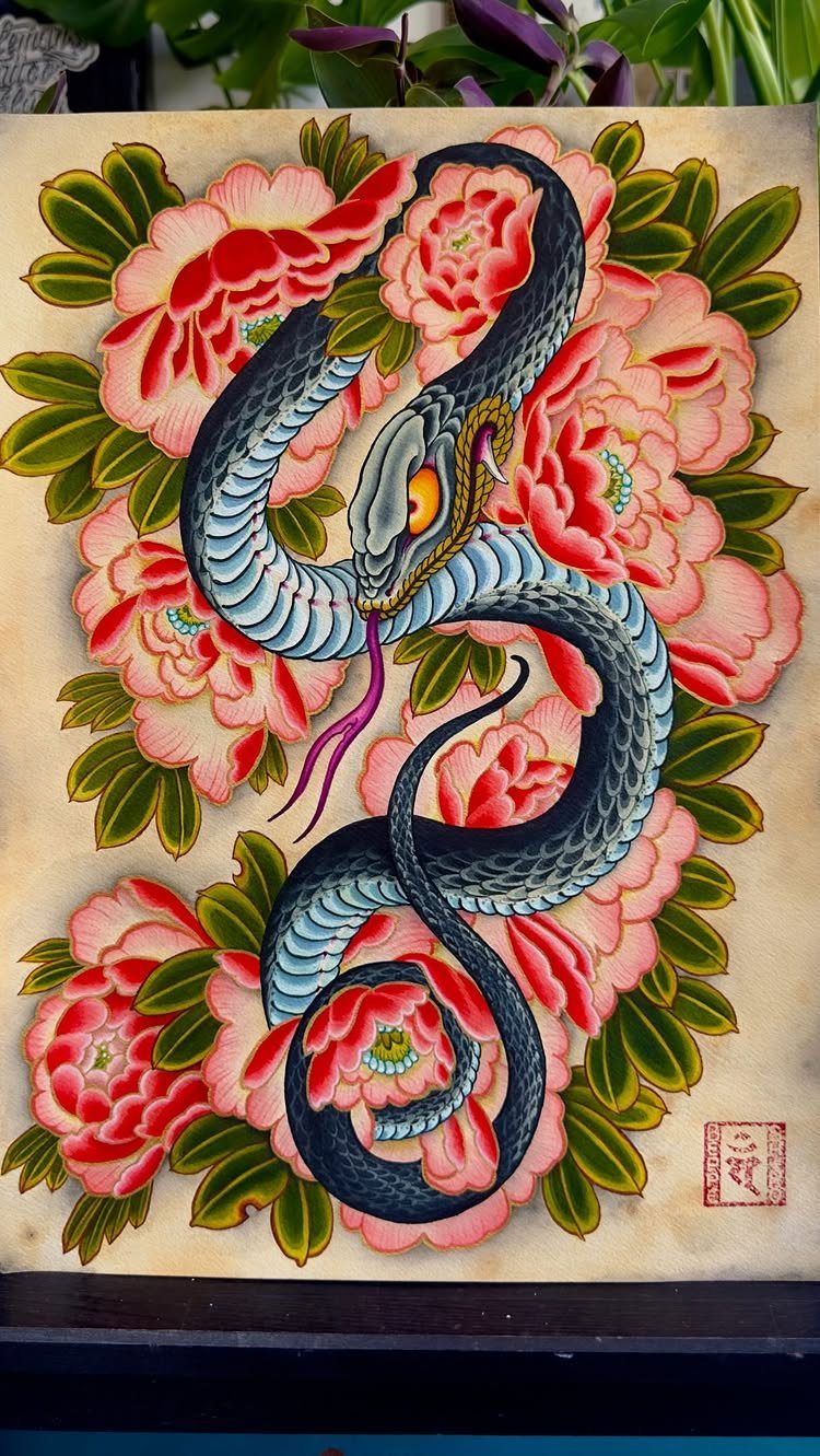Dark blue snake winding through bright red peony flowers in a tattoo design.