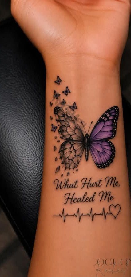 Purple butterfly tattoo on forearm with the quote What Hurt Me, Healed Me