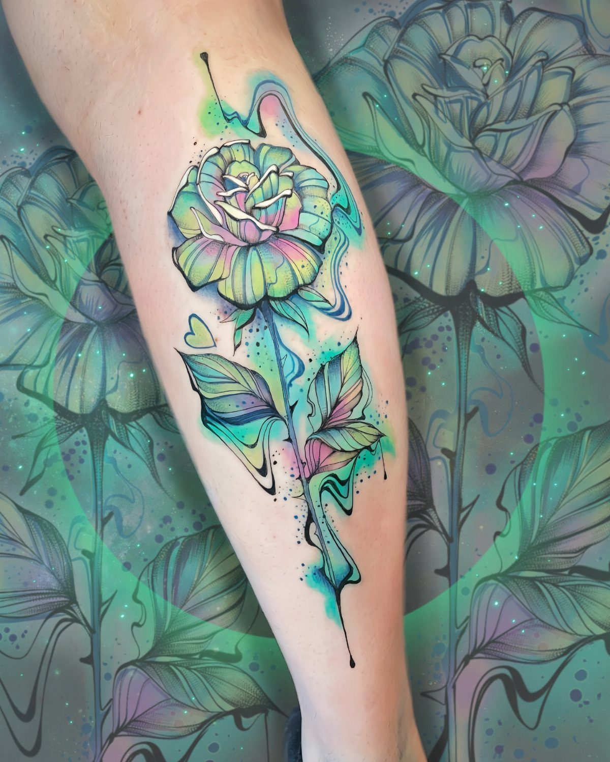 Watercolor rose tattoo on a leg with vibrant greens, blues, and purple paint drips.