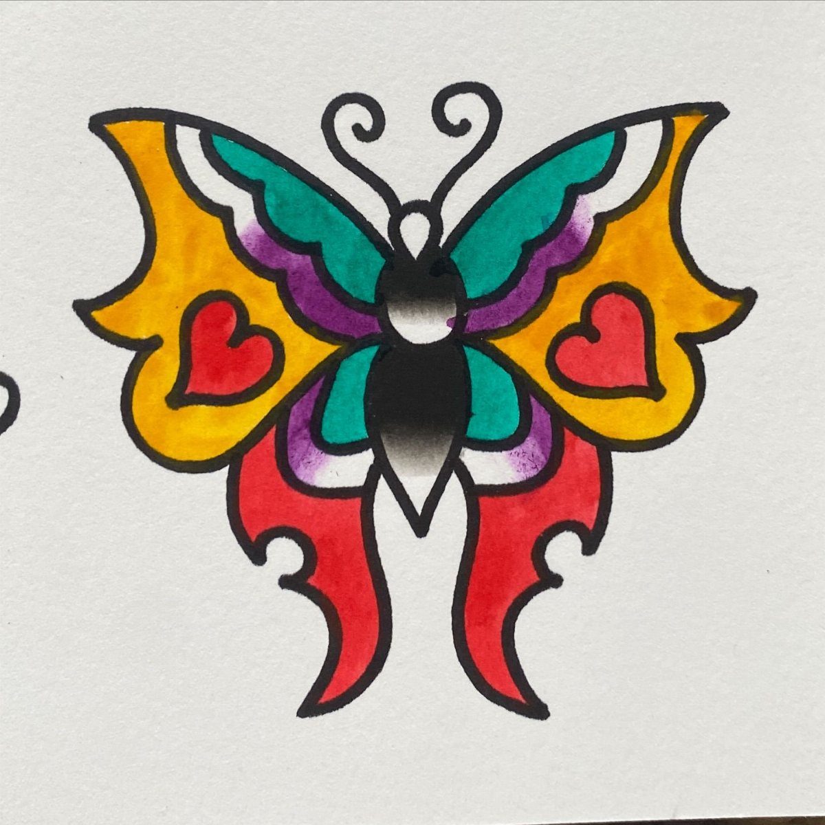 Traditional butterfly drawing with red hearts on yellow wings and bold black outlines